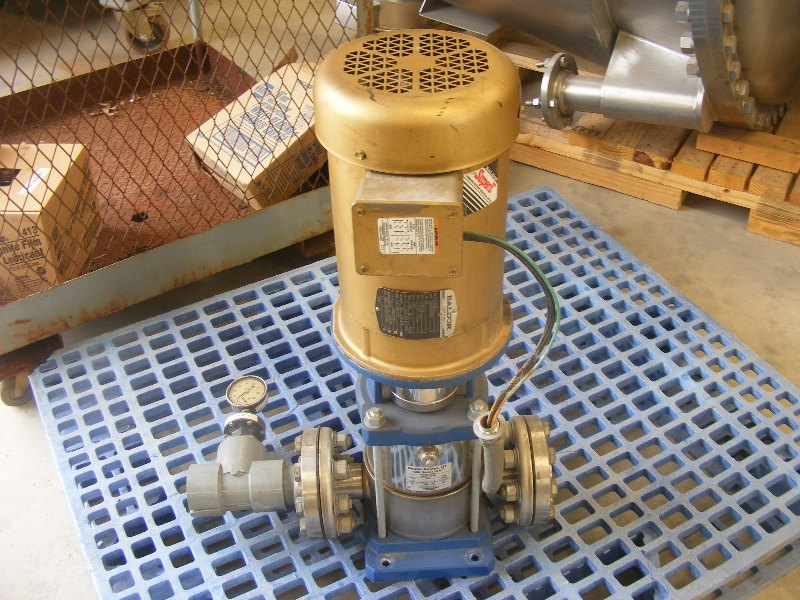 Goulds SSV Vertical Stainless Steel in line pump. Size 4SVD1J9BO.  Driven by a 5 HP. 230/460, 3470 rpm motor.